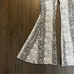 Snake print flare jeans